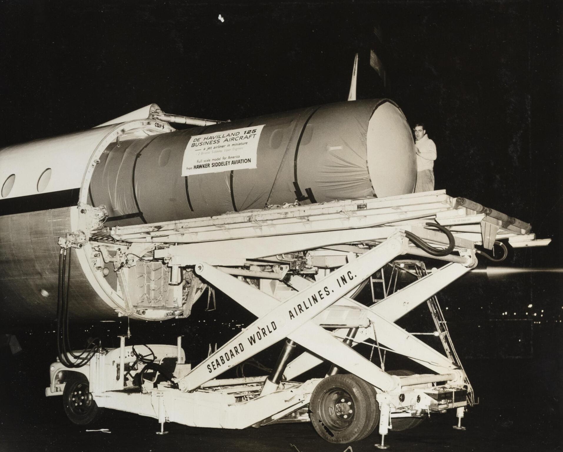 The DH.125 mock-up being unloaded at Idlewild Airport, New York, where it was flown from London Airport (Heathrow), 1963.