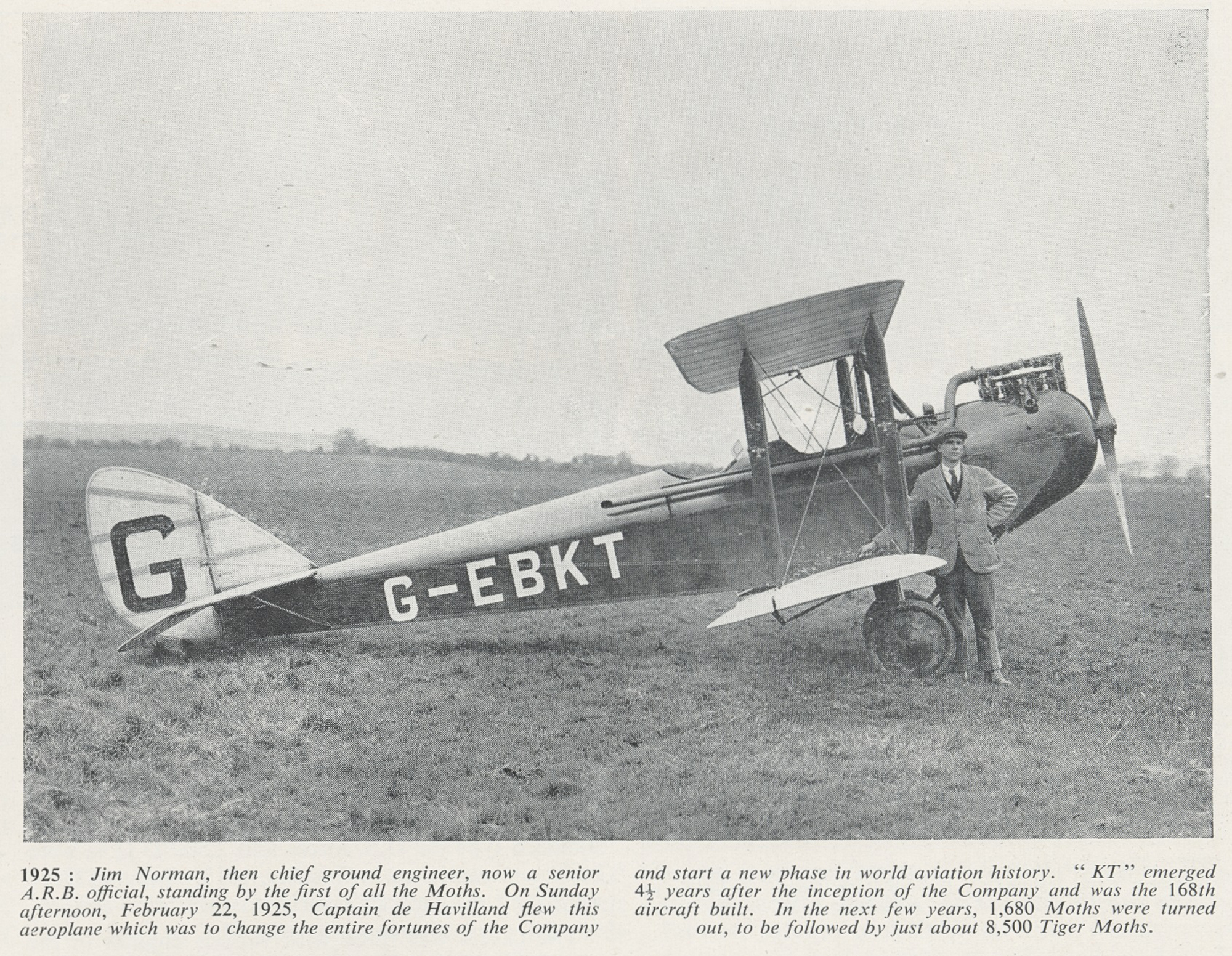 Jim Norman, chief ground engineer, de Havilland Aircraft, standing next to the first de Havilland Moths - G-EBKT, 1925. "KT" was the 168th aircraft built by the company.