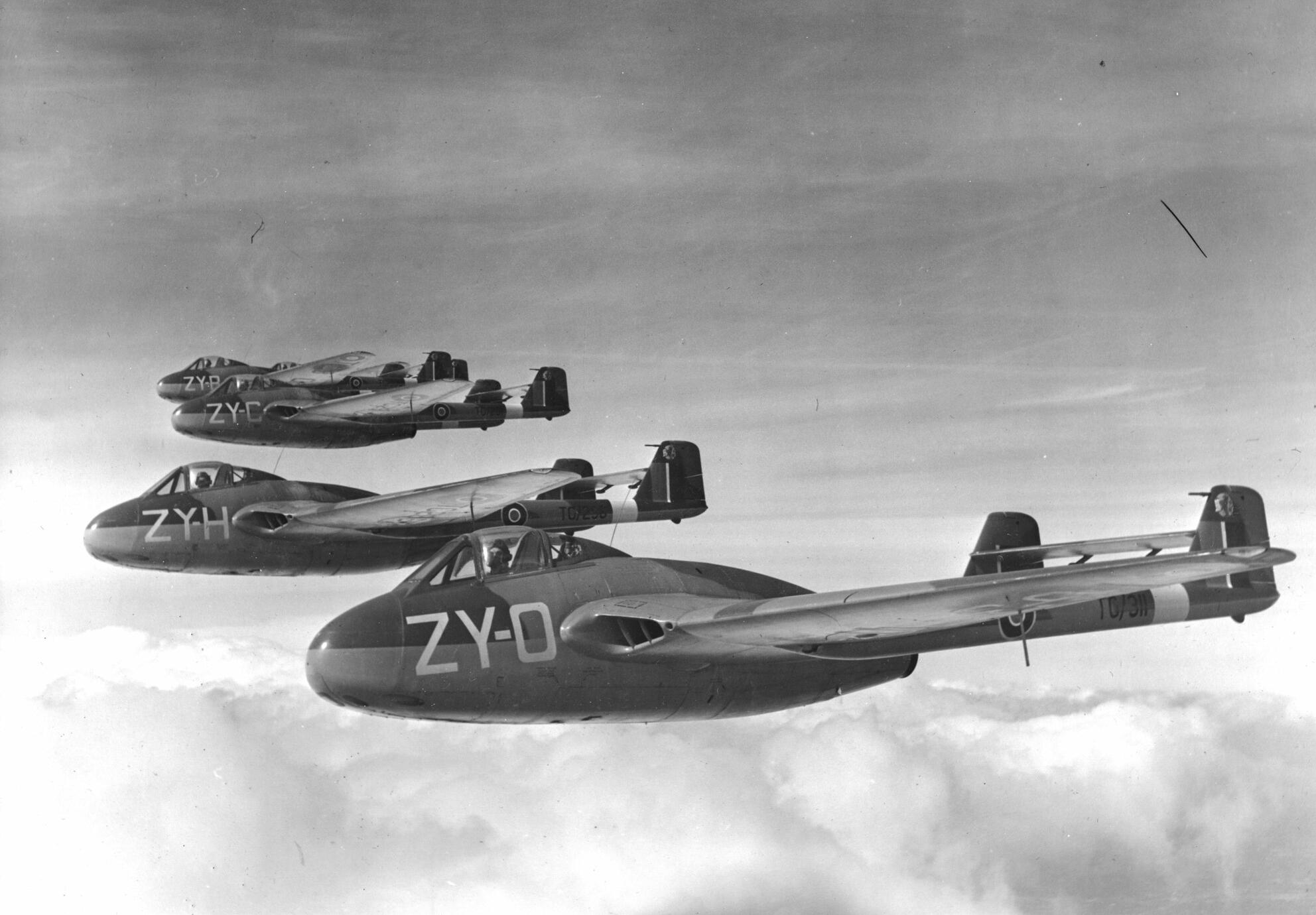 de Havilland DH.100 Vampires flying in formation - first squadron at Odiham, 25th July 1946.