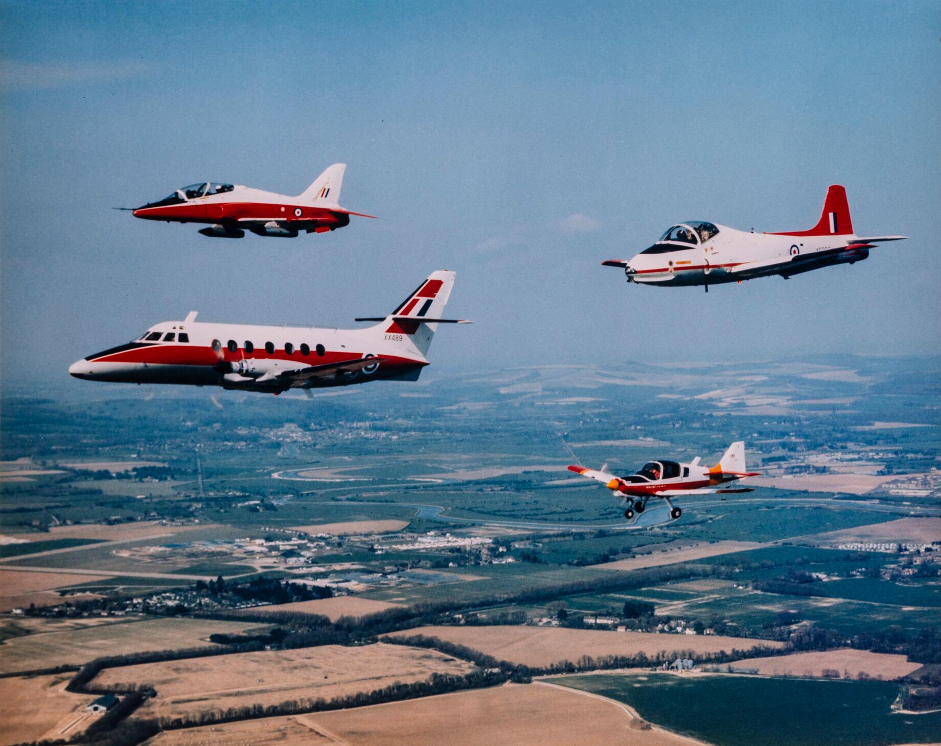 Jetstream, Bulldog, Hawk and Jet Provost aircraft flying in formation, c. 1978.