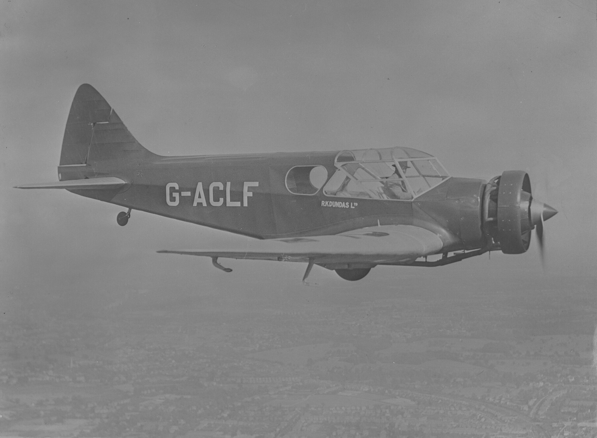 An air-to-air photograph of Airspeed AS5B Courier G-ACLF