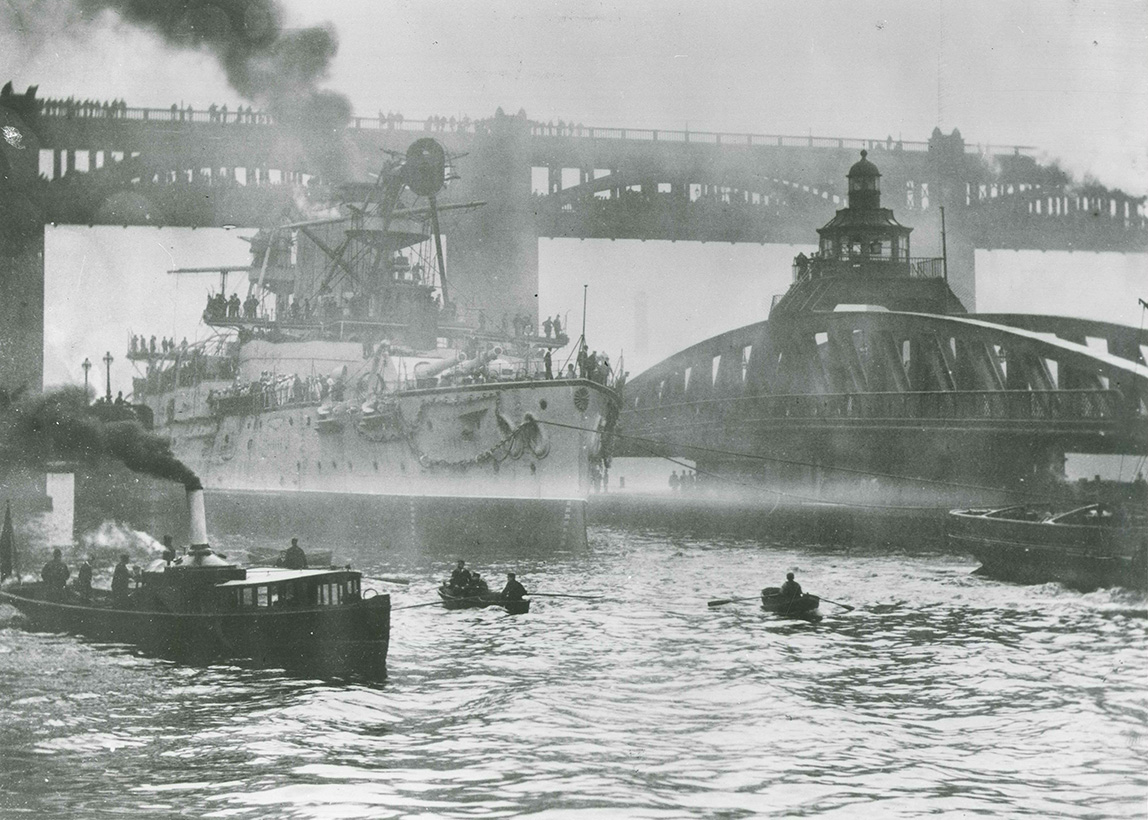 Japanese battleship H.I.J.M.S Hatsuse departing from Elswick through swing bridge, 1899.
