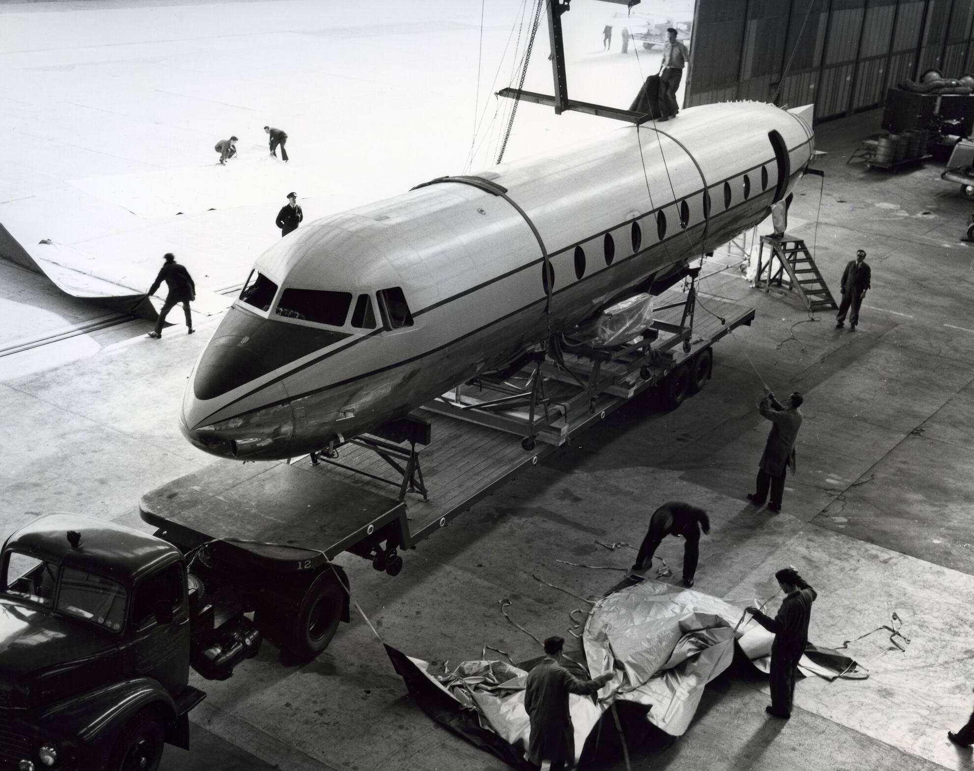 Hawker Siddeley HS748 - production view of fuselage being loaded onto a lorry.