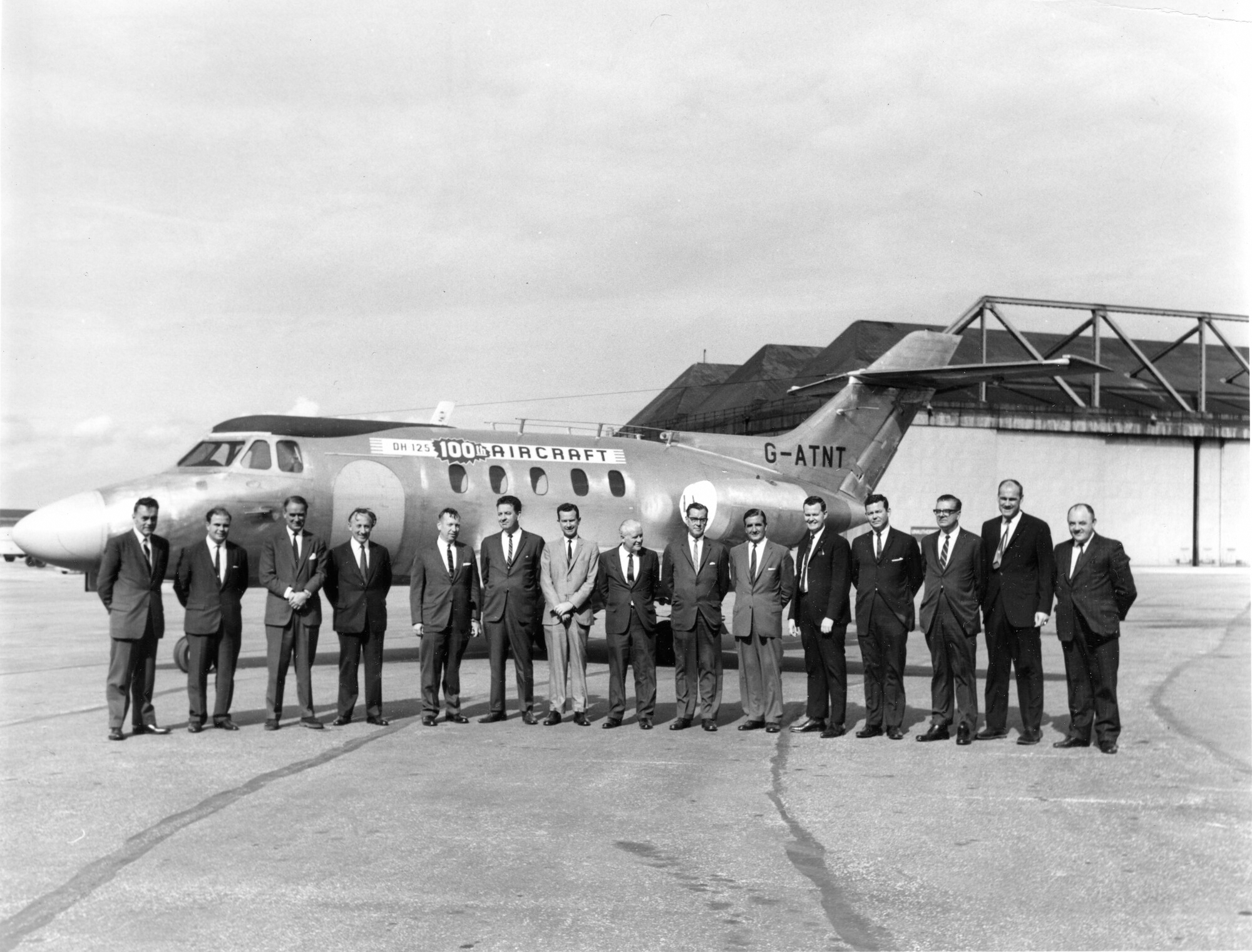 HS125-1A - G-ATNT ground view of 100th roll-out with personnel, 1966.